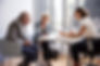 Couple Sitting with Financial Advisor